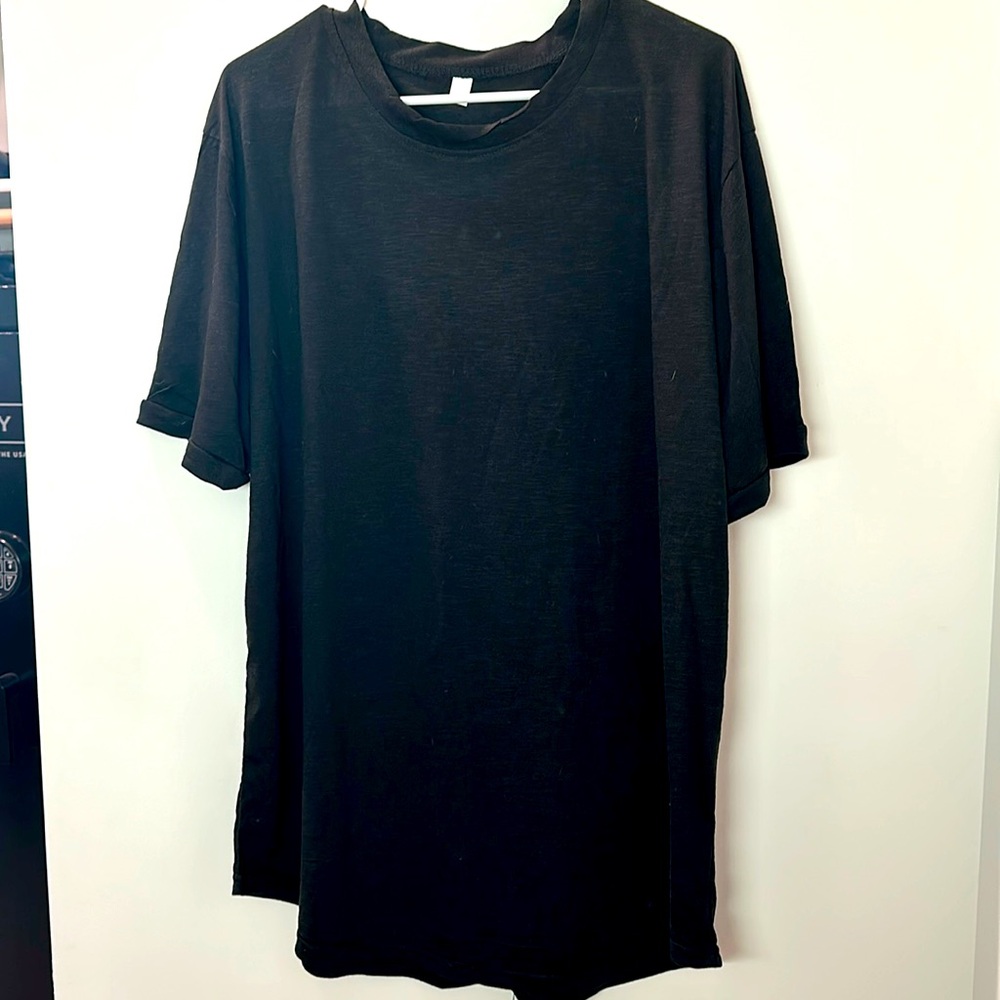 Black womens T-shirt. Casual style. 95% Polyester 5% Spandex.